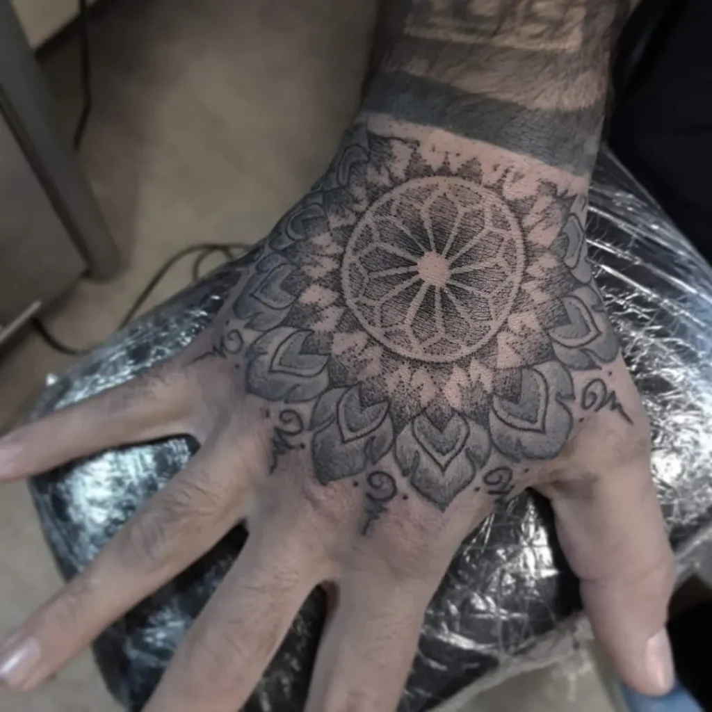 hand tattoos mandala