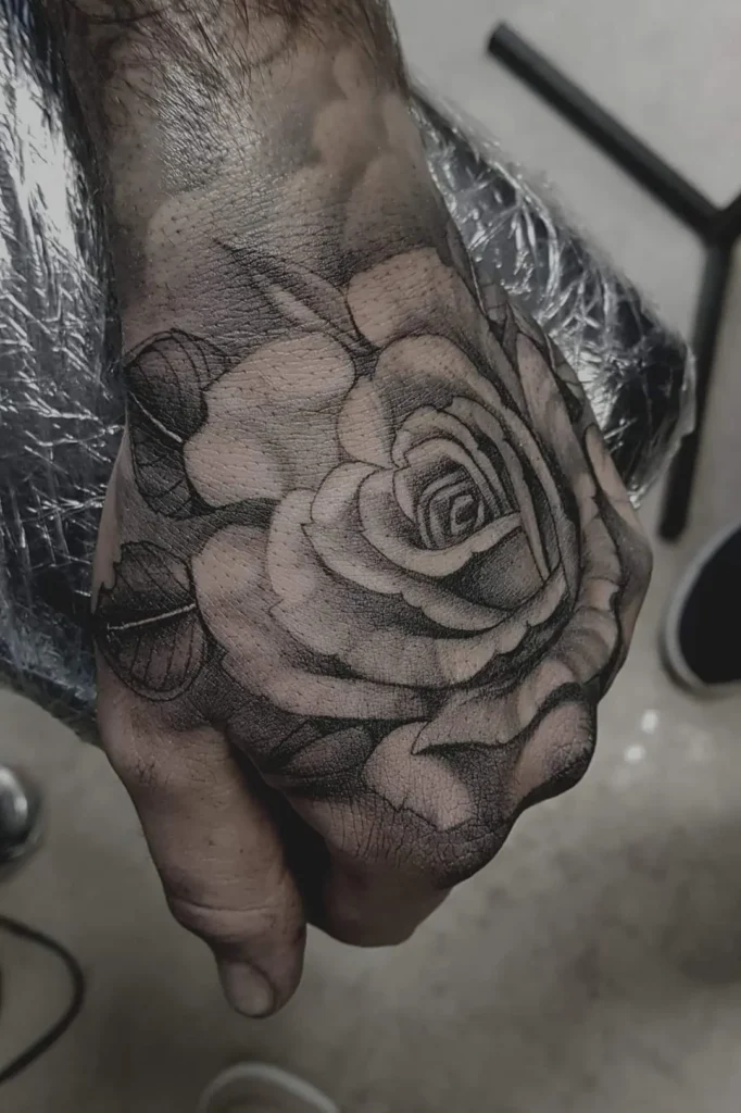 rose hand tattoos for men