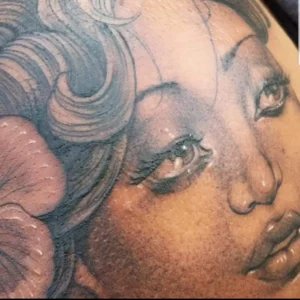 polynesian lady head tattoo