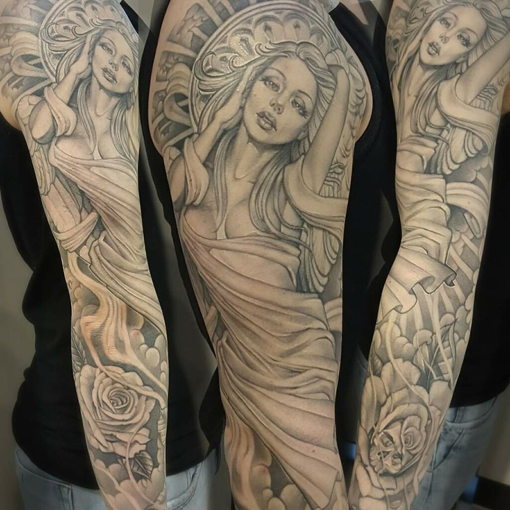 fine line single needle angel of engel tattoo