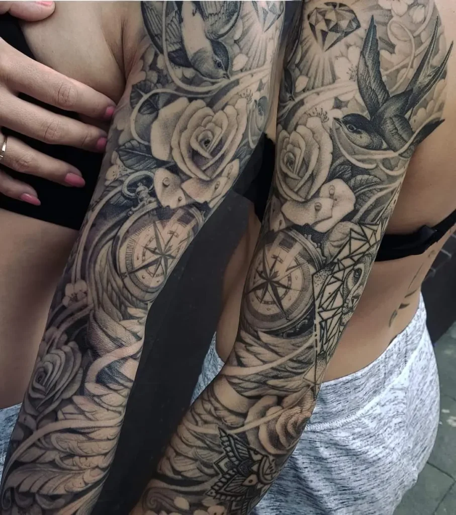 kompas tattoo met zwaluw